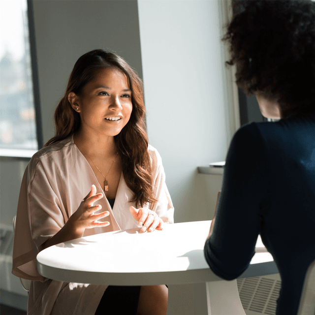 Candidate answering interview questions demonstrating effective interview strategies during a job interview.